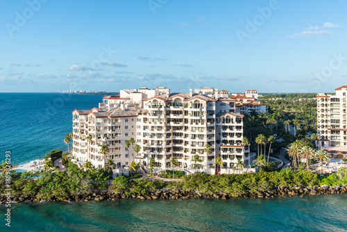 View of luxury oceanfront residential buildings from a cruise ship in Fisher Island, Miami, Florida, United States of America