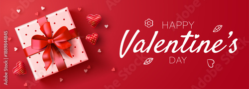Festive Happy Valentines Day greeting banner with a gift box and decorative hearts.