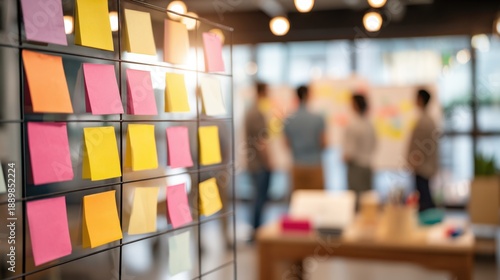 Team Members Participate in a Standup Meeting Discussing Tasks at a Kanban Board With Many Blank Cards Displayed