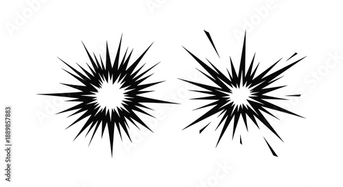 Two striking black starburst shapes with radiating spikes evoke a sense of dynamic energy and abstract design