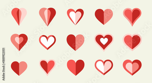 Assortment of stylized heart shapes in red and white tones conveying love and affection