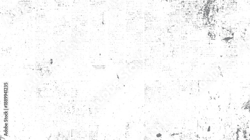 Faded grey textured background with scattered dark grey smudges and dots resembling aged paper or distressed grunge overlay