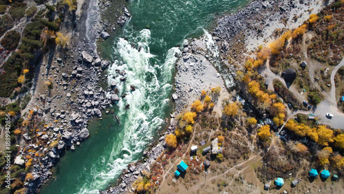 Tableau sur toile Aerial River Gorge With Research Camp, Small Tents Clustered On Rocky Flats, Mea