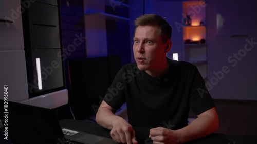 An Indignant Male Presenter Vocally Condemns Industry Shortcomings Passionately, Furious Male Creator Passionately Criticizes Industry Mistakes With Expressive Gestures And Intense Emotion