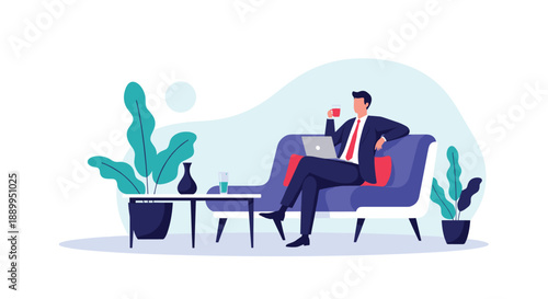 Businessman in a suit and red tie relaxes on a comfortable sofa while working on his laptop and enjoying a drink in a modern living space.
