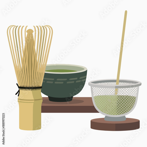 Traditional Japanese matcha tea set including a bamboo whisk and a ceramic bowl with freshly brewed green tea and a sifter for authentic tea ceremony prep.