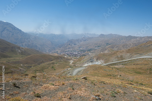 A view of Hakkari province from above. Hakkari in spring. A view of Yüksekova, Hakkari city from the mountains. Yüksekova, Hakkari, Türkiye.
