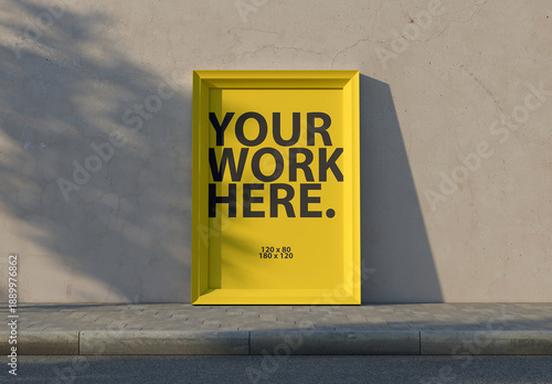 Vertical Framed poster Mockup next to concrete wall on the street