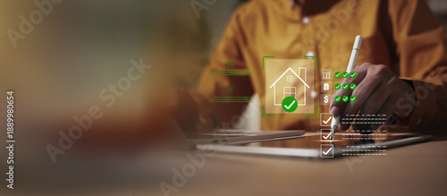 Photos Person checking documents and requirements related to home purchase, sale, or loan approval