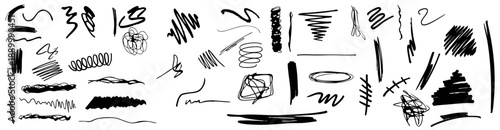 A collection of various black ink strokes and scribbles on a white background
