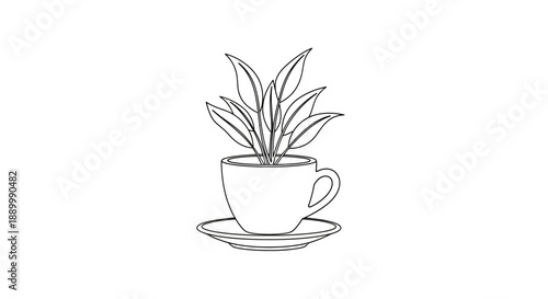A hot espresso beverage in a white ceramic coffee cup and saucer served with fresh green flowers for a cafe breakfast