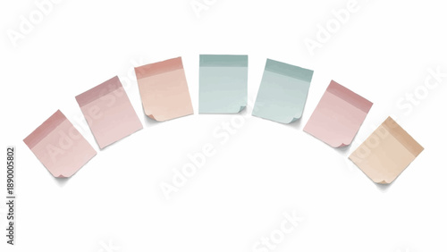 Collection of pastel colored paper bags arranged in a semicircle on white