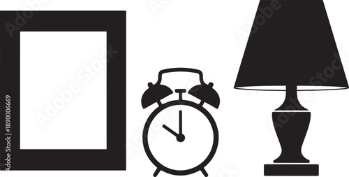 Black silhouette of a frame alarm clock and table lamp on white background