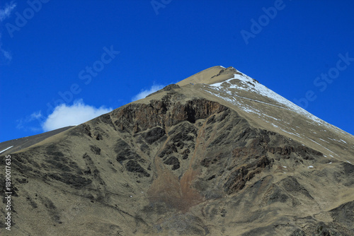 The top of the mountain with a little snow