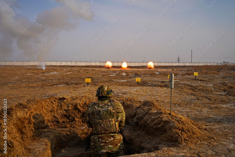 Fototapeta premium Detonation of a mined field. Military exercises.