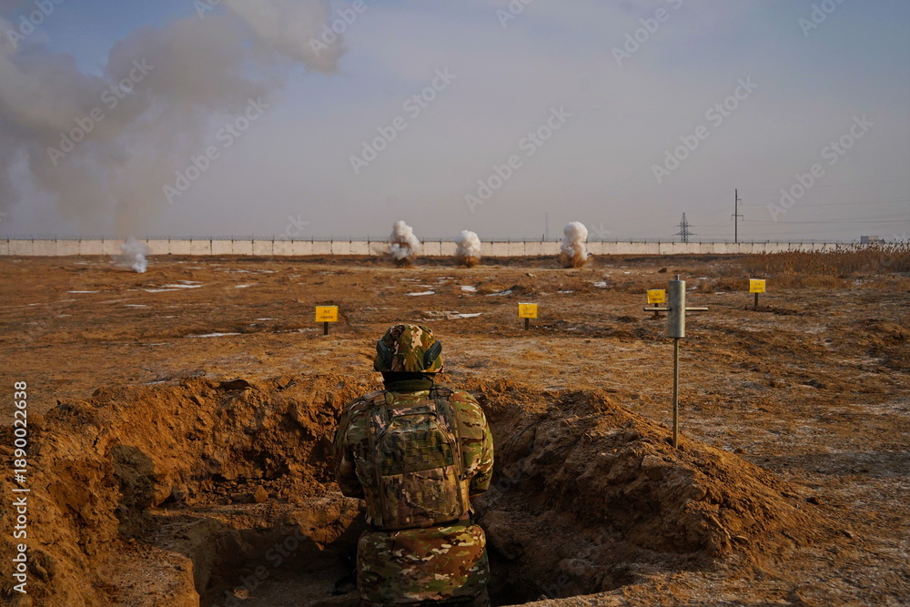 Fototapeta premium Detonation of a mined field. Military exercises.