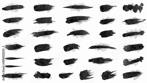 Collection of 28 black brush strokes in various shapes and sizes on white