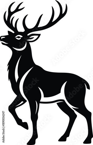 Majestic stag with large antlers standing proudly in a serene forest landscape viewed from the side