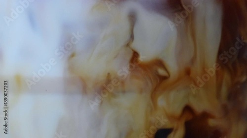 Wallpaper Mural 4K Abstract fluid motion of brown and golden liquid swirling in coffee creating soft organic patterns. Concept of creativity, calm flow, artistic texture, movement background. Torontodigital.ca