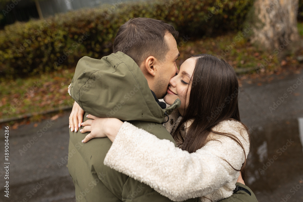 Fototapeta premium Young couple walking in the park