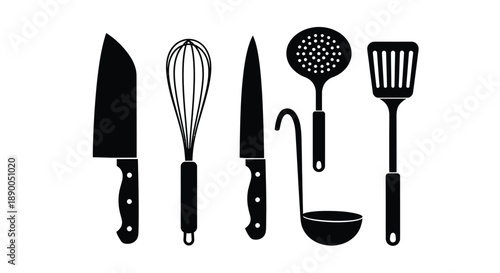 Black kitchen utensils arranged in a row a striking silhouette