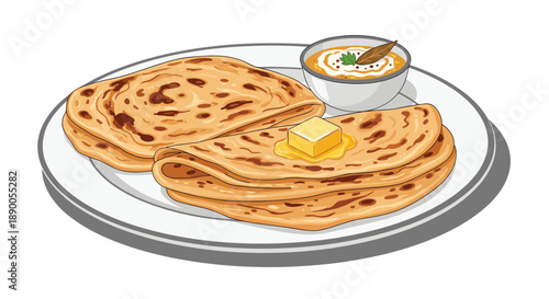Plate of flaky golden paratha flatbread topped with melting butter and served with a side bowl of creamy curry or dal.