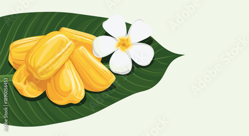 Tropical fruit platter featuring sweet yellow jackfruit segments on a large green banana leaf with a white frangipani flower.