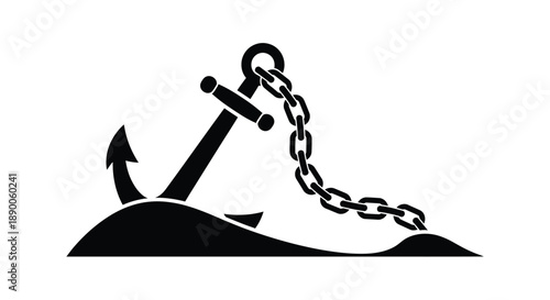 Black anchor with chain resting on sand a striking silhouette