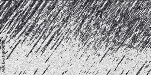 Abstract background with diagonal streaks and granular texture in grayscale, resembling rain or brushstrokes for a dynamic and artistic visual effect