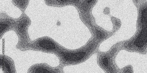Abstract grayscale organic blob shapes with granular texture and soft edges creating a unique background pattern for design and digital art applications