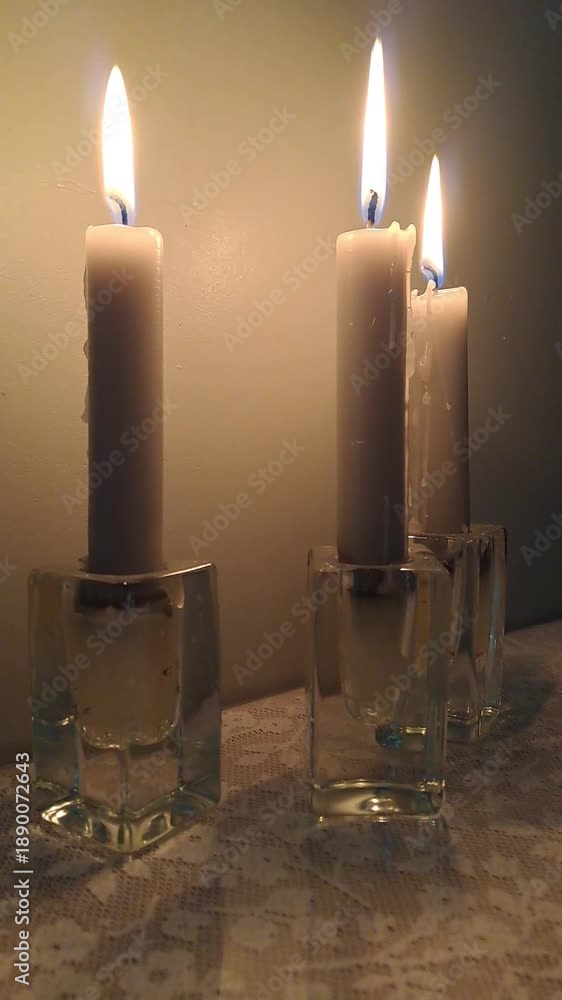 custom made wallpaper toronto digitalThree White Candles Burning in Glass Holders on Lace Surface