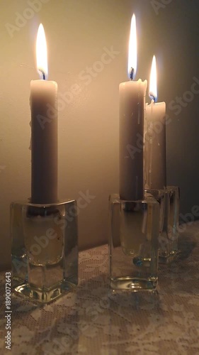 Wallpaper Mural Three White Candles Burning in Glass Holders on Lace Surface Torontodigital.ca