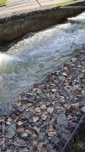 Wallpaper Mural Fast Flowing Water in Artificial City Canal with Stone Gabions Torontodigital.ca