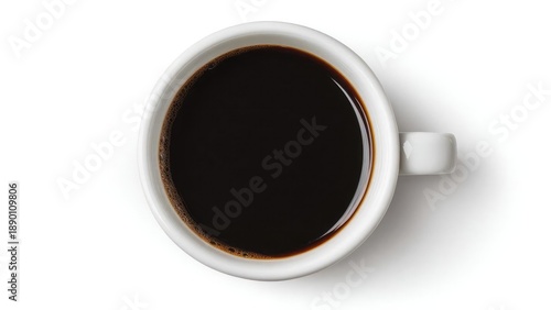 Top-down view of a white mug filled with dark coffee. Concept Top-down shot, White mug, Dark coffee, Flat lay, Minimalist cafe