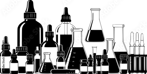 Various medical and laboratory bottles and vials on white background
