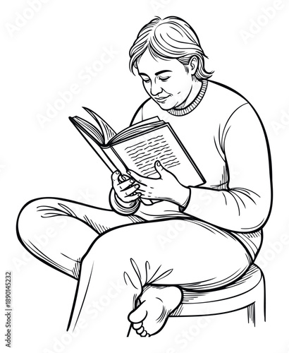A person quietly enjoys reading a book while sitting comfortably crosslegged on a stool, perfect for educational materials, literary promotions, or showcasing leisurely activities.