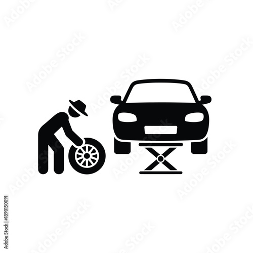 A mechanic changing a tire on a car using a jack depicted in black
