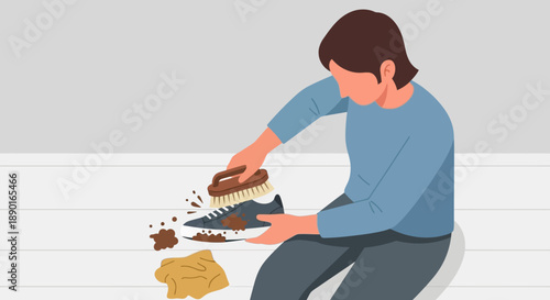 Person crafting a clay sculpture with stones and tools on the ground.