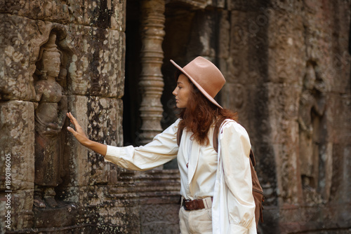 Angkor Wat Ta Som Temple - Asian Traveler Exploring Ancient Stone Reliefs