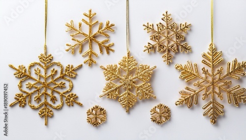 Golden Snowflakes On White Background