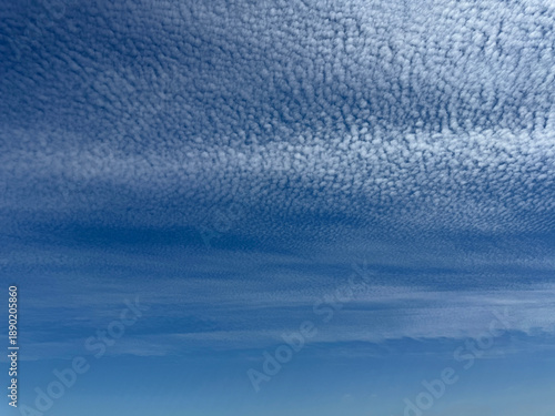 Canvas Print Cirrocumulus clouds in blue sky.