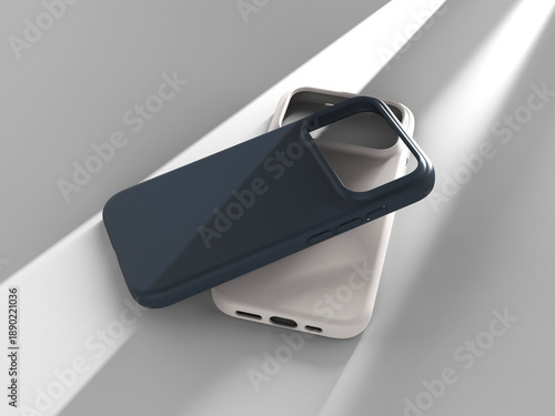 Two phone cases in rays of light. 3D render