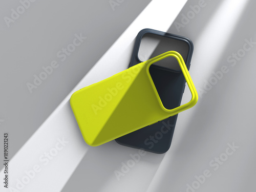 Two phone cases in rays of light. 3D render