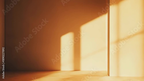 Wallpaper Mural Empty minimalist room receiving warm golden hour sunlight, creating sharp, angular shadow patterns across the smooth walls and concrete floor, highlighting the architectural minimalism Torontodigital.ca