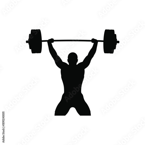 Powerful Silhouette of a Muscular Male Athlete Lifting Heavy Barbell