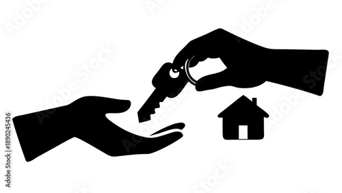 Silhouette of two hands, one passing a house key to another, real estate closing and home ownership concept.