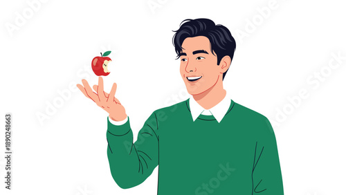 Handsome young Asian man in a green sweater smiling while magically levitating a bitten red apple above his finger on white.