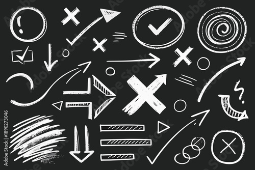 White chalk crayon doodles of arrows circles checkmarks and x marks on blackboard