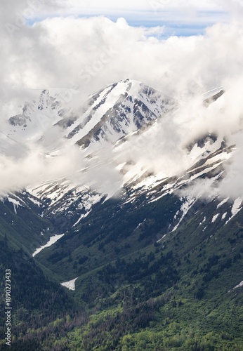 Wallpaper Mural Fog sweeps around mountain peaks with remnants of snow, view from Slaughter Ridge Trail, Cooper Landing, Kenai Peninsula, Alaska, USA Torontodigital.ca