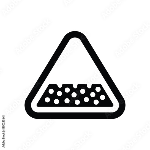 Black and white triangular warning sign depicting loose gravel road hazard